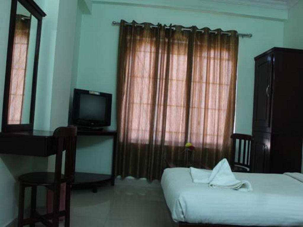 Sm Regency Kochi Kamer foto